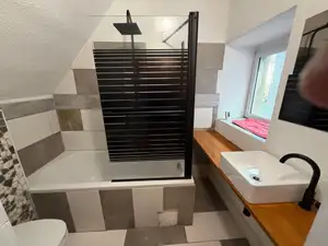 Himmelswege bathroom with bathtub and washbasin